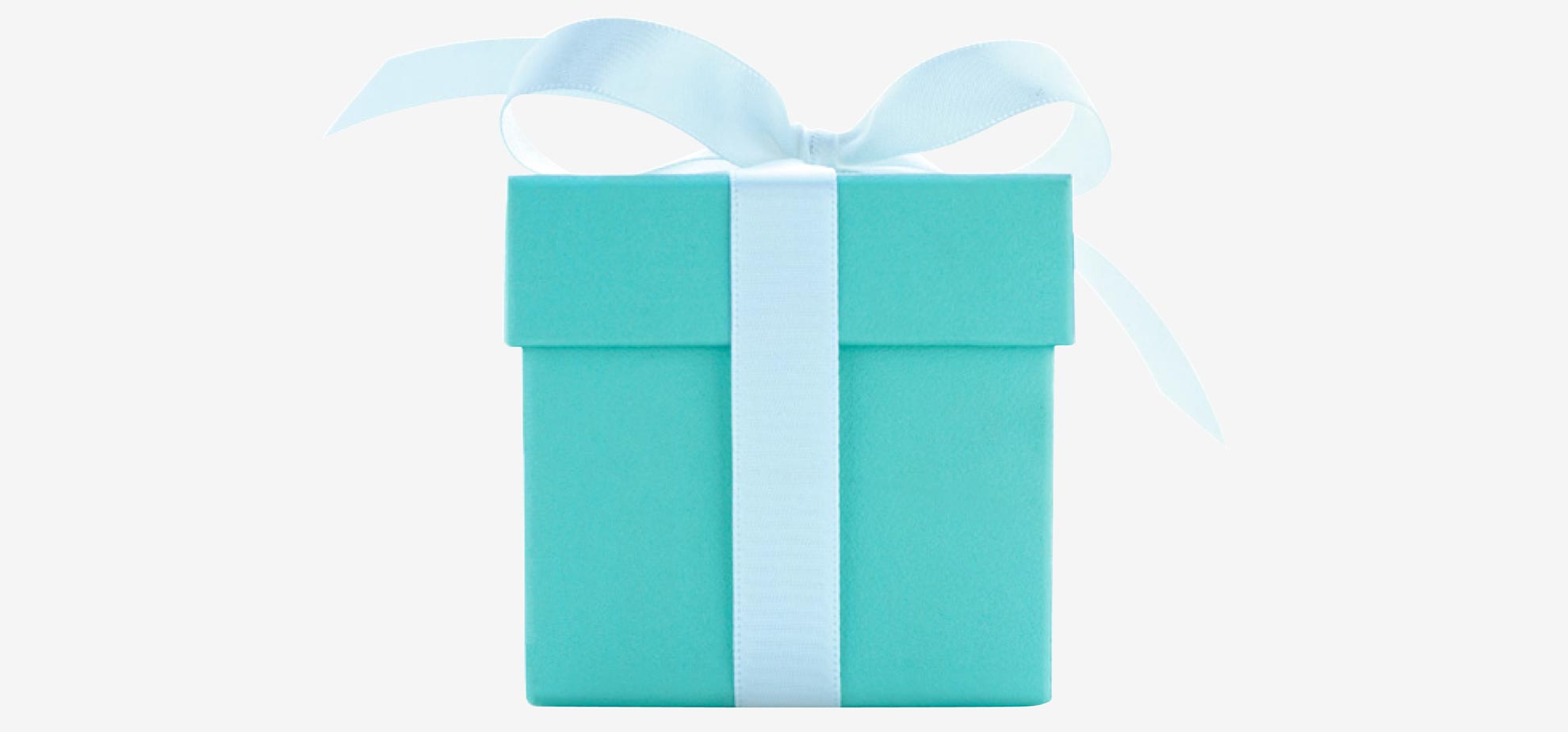 Crowned with a white ribbon, the Tiffany Blue Box is an international ...